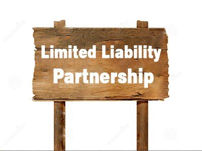 Business partners discussing partnership firm registration documents